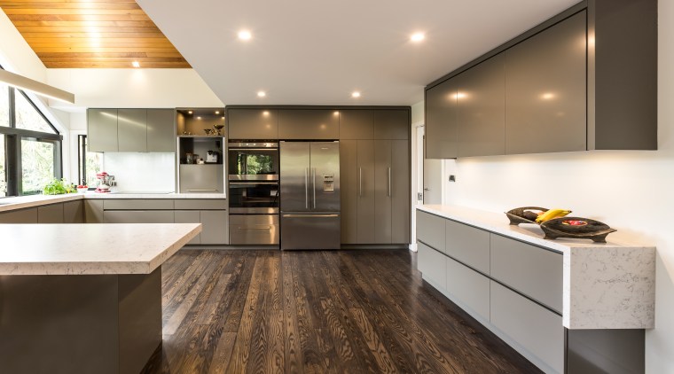 This new kitchen by Kitchens By Design teams cabinetry, countertop, cuisine classique, floor, flooring, hardwood, interior design, kitchen, laminate flooring, real estate, room, wood flooring, gray, brown