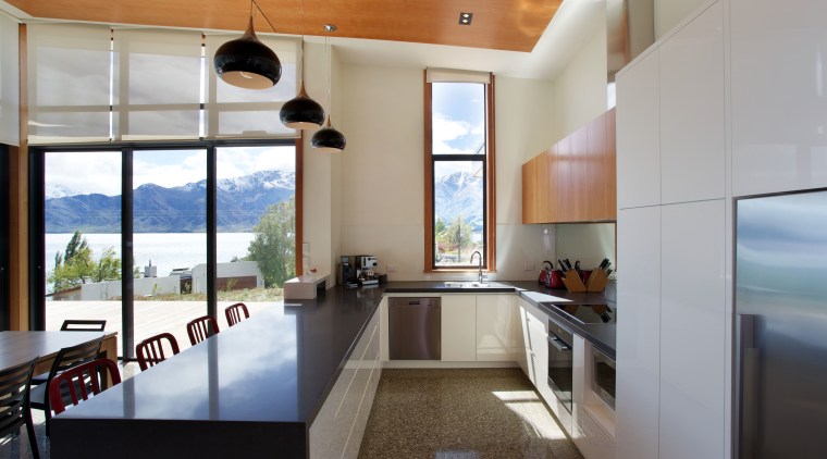 Large sliding doors open up the entire family architecture, ceiling, countertop, interior design, kitchen, real estate, gray