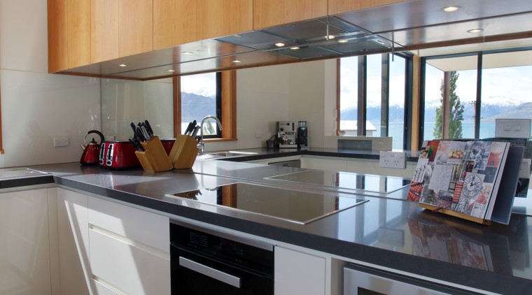 The views in this new holiday home are cabinetry, countertop, cuisine classique, interior design, kitchen, real estate, gray