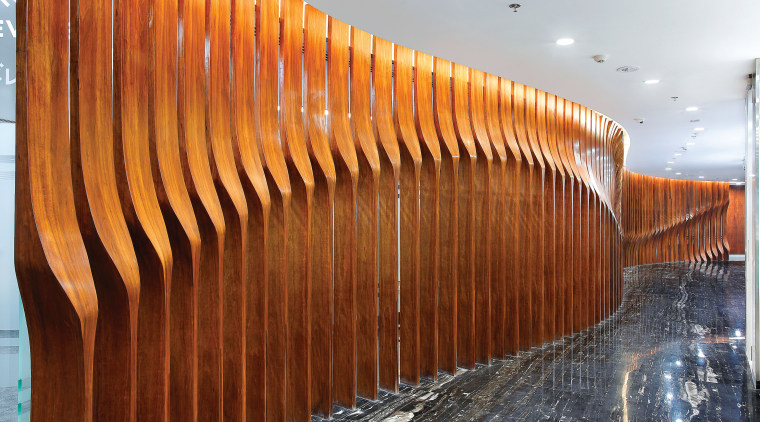 Full-height wood fins screen the managing directors office architecture, wall, wood, brown