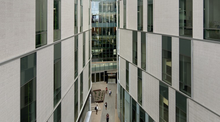 The canyon between the two wings of this apartment, architecture, building, commercial building, condominium, corporate headquarters, daylighting, facade, glass, headquarters, lobby, metropolitan area, mixed use, neighbourhood, residential area, tower block, window, gray