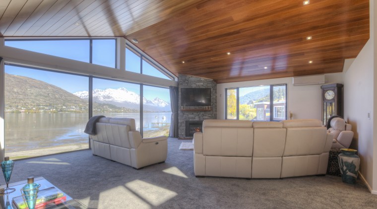 The upper main living level offers plenty of ceiling, daylighting, estate, home, house, interior design, living room, property, real estate, window, gray, brown