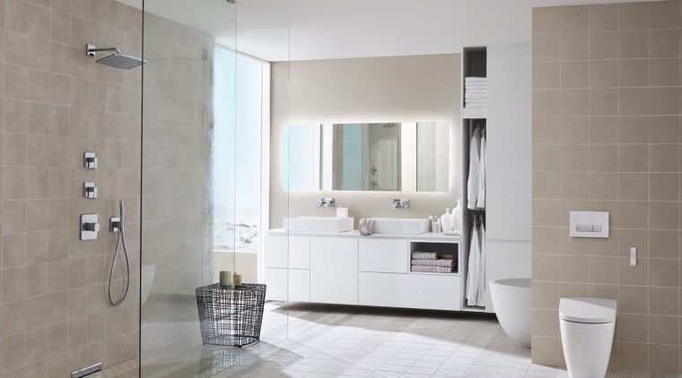 Geberits space-saving in-wall cisterns are an increasingly popular bathroom, bathroom accessory, bathroom cabinet, floor, flooring, interior design, laminate flooring, plumbing fixture, room, sink, tile, wall, wood flooring, gray
