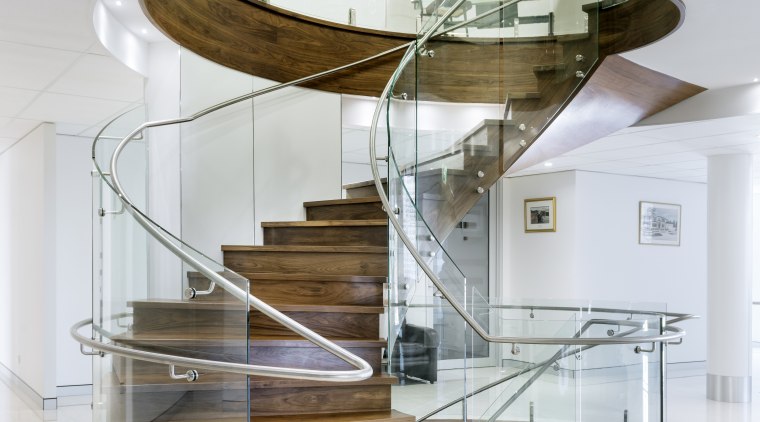 Tight curves in the glass balustrade help make furniture, glass, interior design, product design, stairs, table, gray, white
