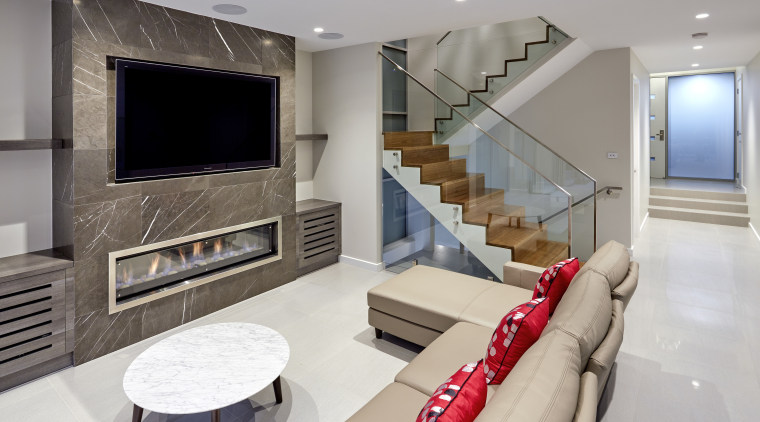 A stone fire surround and wood and glass ceiling, floor, home, interior design, living room, real estate, room, gray