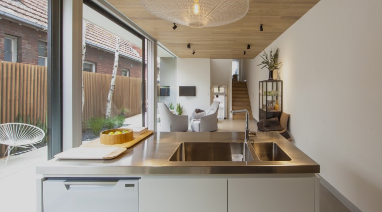 With plenty of room to move behind the cabinetry, ceiling, countertop, cuisine classique, interior design, kitchen, real estate, room, gray, brown