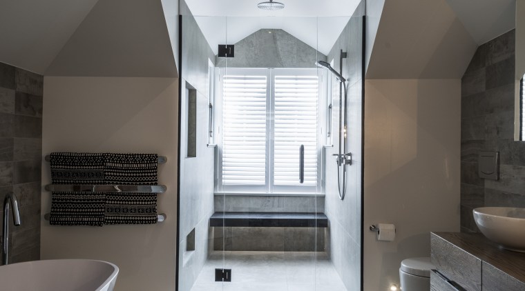 A rain showerhead is tucked up high into architecture, ceiling, daylighting, estate, floor, flooring, home, house, interior design, room, gray