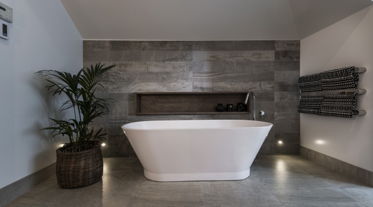 The side walls of this bathroom are finished architecture, bathroom, floor, flooring, interior design, product design, room, tile, wall, gray