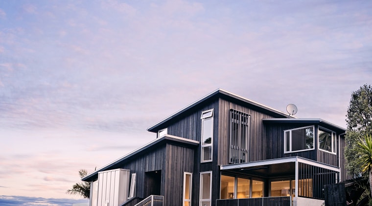 Designed by architect Robyn Bilkey and built by architecture, building, cottage, estate, facade, home, house, property, real estate, residential area, sky, purple
