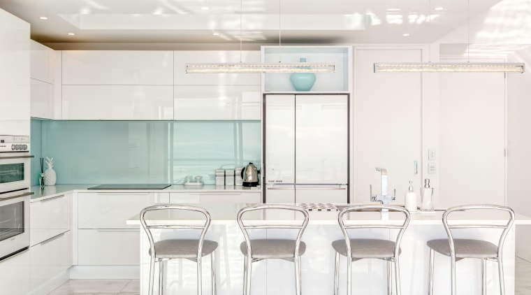 This seaside home by architect Stephan Meijer sits furniture, interior design, kitchen, product design, table, white