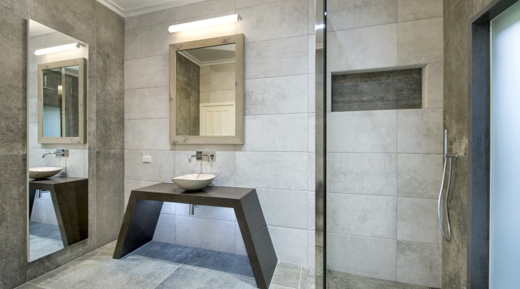 For this dressed to impress bathroom, designer Owen architecture, bathroom, floor, interior design, real estate, room, tile, gray