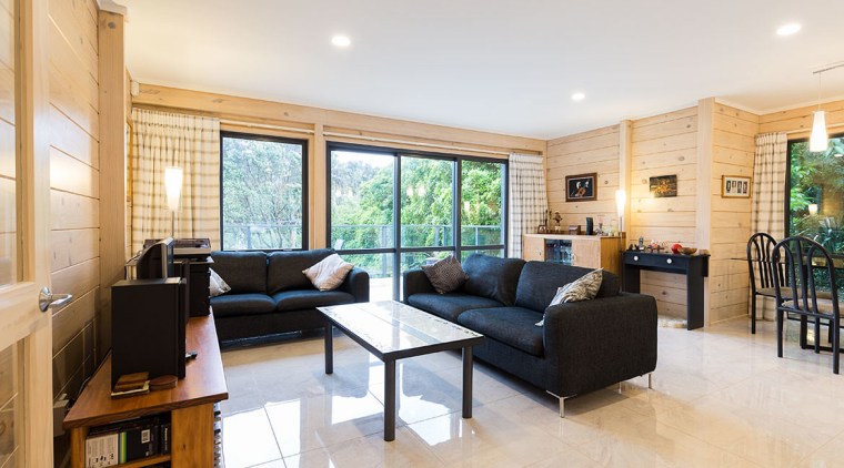 This Lockwood design optimises space and light. The floor, flooring, interior design, living room, property, real estate, room, white