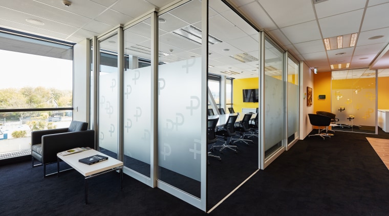 The logo for lawyers Tavendale and Partners is ceiling, glass, interior design, office, real estate, wall, gray, black
