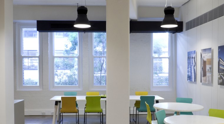 Colourful seating and existing windows overlooking the tree-lined architecture, ceiling, daylighting, floor, flooring, furniture, interior design, loft, table, gray