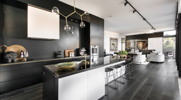 The top NABD award for 2015 Best Alteration/Addition countertop, interior design, kitchen, loft, black, white