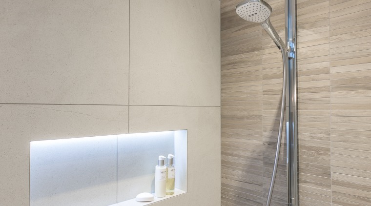 Simple touches like internally lit wall niches both angle, bathroom, floor, interior design, plumbing fixture, product design, tap, tile, wall, gray