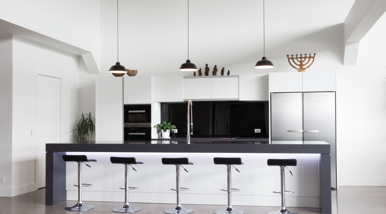 LED lights above the cabinets and under the architecture, ceiling, countertop, floor, flooring, furniture, interior design, kitchen, loft, product design, table, gray
