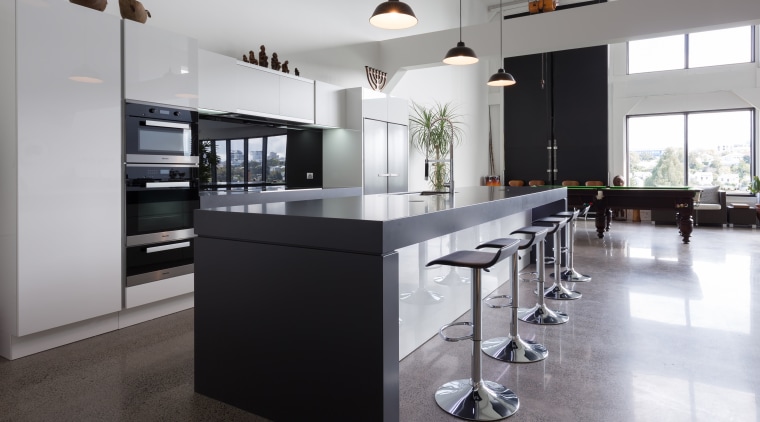 This kitchen is positioned a reasonable distance from countertop, floor, flooring, interior design, kitchen, real estate, gray, black