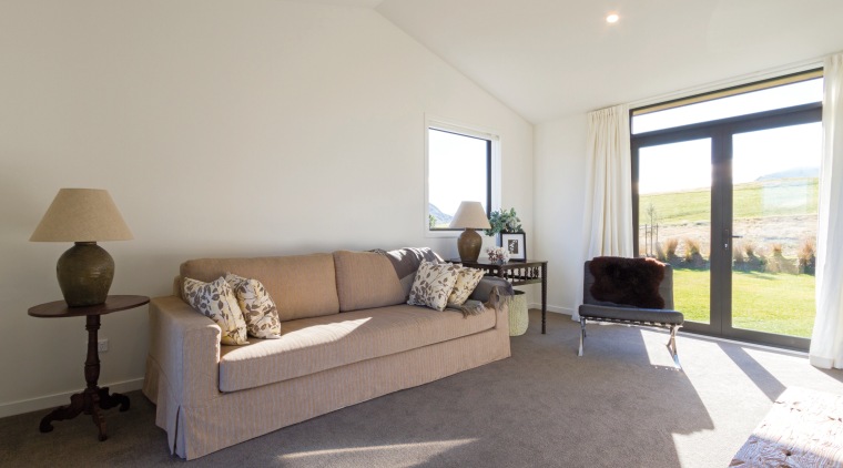 All public spaces, including this second living area, estate, floor, home, house, interior design, living room, property, real estate, room, window, gray
