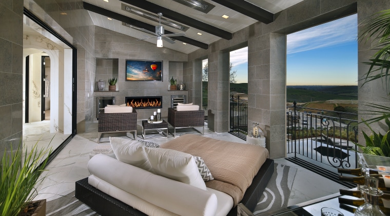 This grand master suite reflects a welcoming fusion estate, home, interior design, living room, real estate, gray, black