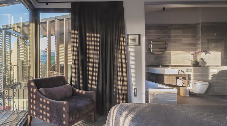 Silk-linen drapes and a velvet chair bring balance architecture, estate, interior design, property, real estate, room, window, gray