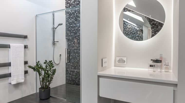 On this project by designer Kira Gray, the ceiling, floor, flooring, interior design, light fixture, product design, gray