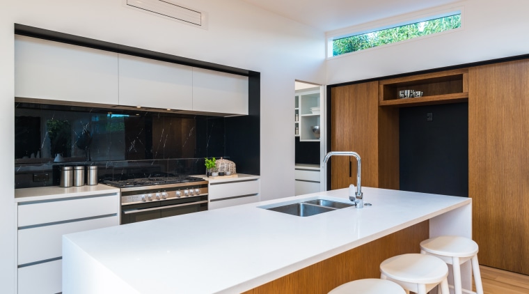A bulkhead heatpump is ideally positioned to discreetly interior design, kitchen, real estate, white, gray