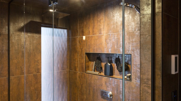To bring light into this bathroom, designer Hayley bathroom, ceiling, floor, flooring, interior design, lighting, room, tile, wall, wood, wood flooring, brown