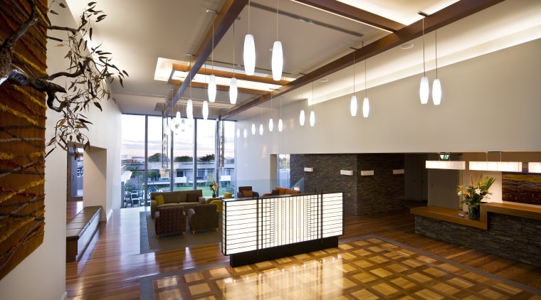 We need to break the perception that retirement architecture, ceiling, daylighting, floor, flooring, hardwood, interior design, living room, lobby, loft, real estate, wood, brown, white