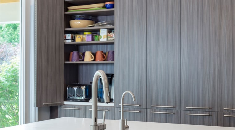 This kitchen by Lauren Levant Interior has an cabinetry, countertop, interior design, kitchen, gray