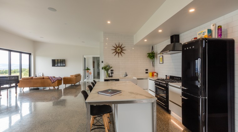 Grandstand this kitchen is in prime location countertop, interior design, kitchen, real estate, room, gray