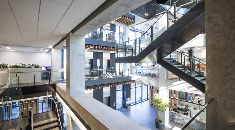 The ECAN buildings intricate bridge and stair systems daylighting, interior design, mixed use, white, gray