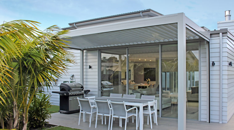 The Bask Outdoor Living Systems louvred roof and house, outdoor structure, patio, real estate, roof, gray