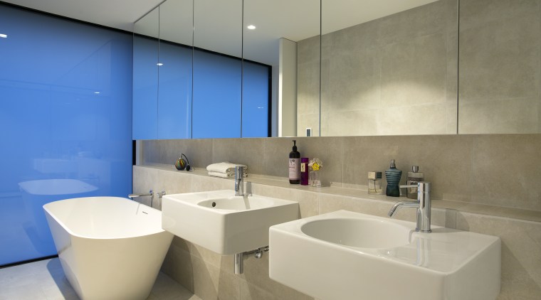 This minimalist bathroom achieves a sense of space architecture, bathroom, interior design, product design, room, sink, brown, orange
