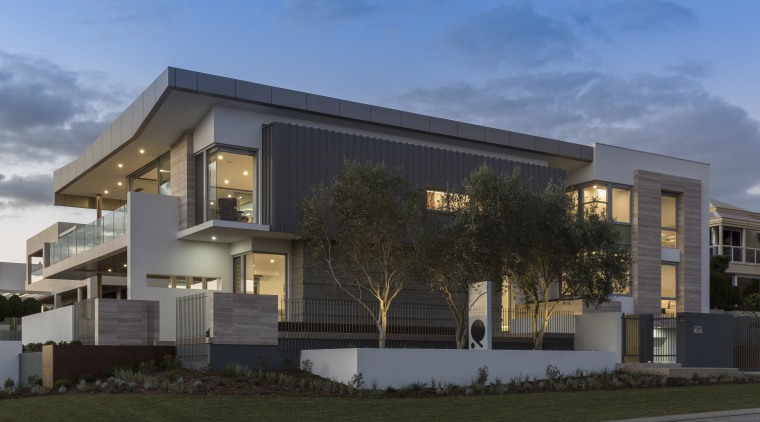 The street-facing side of this home,by house designer apartment, architecture, building, commercial building, condominium, corporate headquarters, elevation, facade, home, house, mixed use, property, real estate, residential area, black, teal