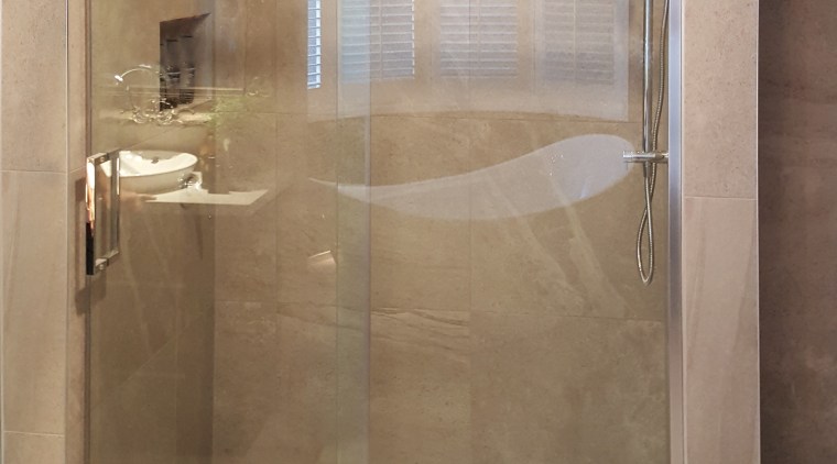 This bathroom by Five Star Bathrooms has many bathroom, plumbing fixture, shower, brown, gray