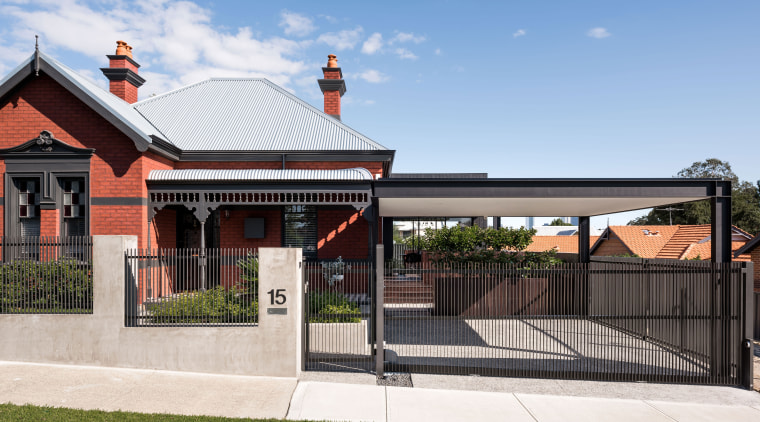 A new clean-lined carport provides the main hint architecture, estate, facade, home, house, outdoor structure, property, real estate, residential area, roof, white