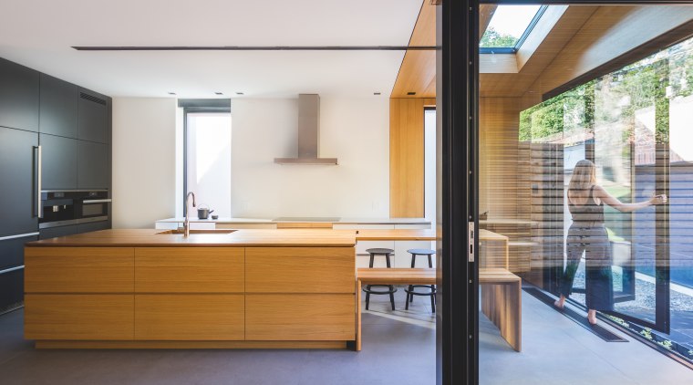 Architect Natalie Dionne says the layout of this architecture, daylighting, house, interior design, real estate, wood, white