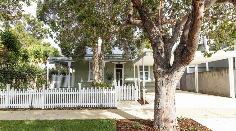 An existing high front fence was replaced with 