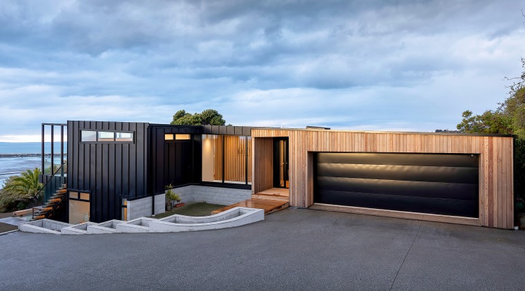 The sloping roof of this home follows the 