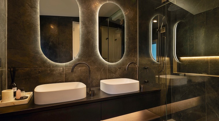 The owners wanted a moody, modern ensuite with 