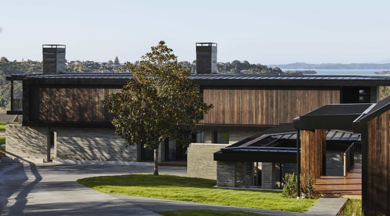 Above the brick ‘base’ walls are rich timber 