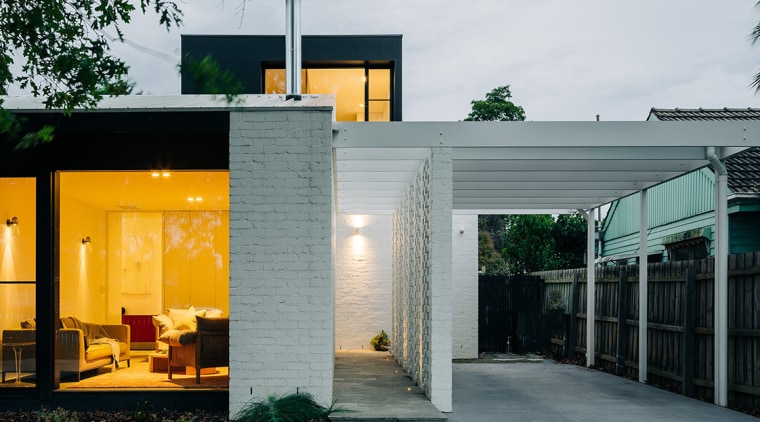 The front of the home at dusk, with 