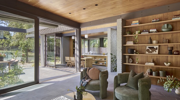 Natural wood finishes predominate even to the living 