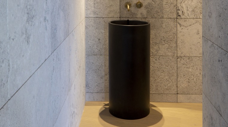The freestanding basin has a sculptural presence – 