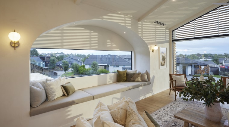 The home builder softened interiors with archways and 
