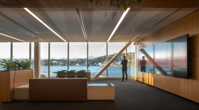 The structure and façade works were undertaken along architecture, building, ceiling, daylighting, design, floor, flooring, house, interior design, lobby, office, room, brown