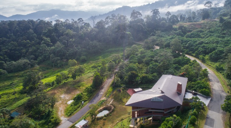 The owners requested homes that suited the cooler aerial photography, bird's-eye view, geological phenomenon, highland, hill, hill station, jungle, landscape, mount scenery, mountain, mountain village, mountainous landforms, rainforest, rural area, sky, vegetation, village, gray