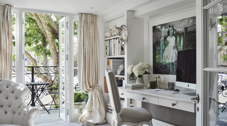 The first-floor drawing room features large, romantic French 