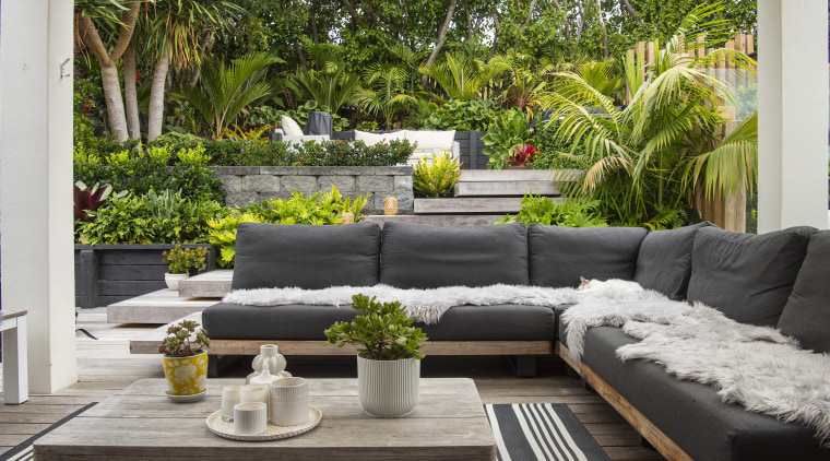 The covered al fresco lounge at pool side. 